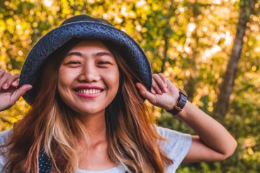 smiling girl in hat