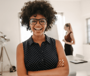 A BCBA with glasses laughs