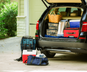 A car trunk packed with road trip essentials.